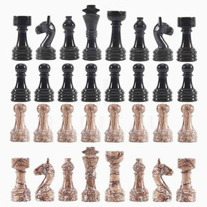 marinara and black chess pieces- chess figures