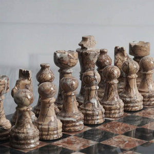 marinara and black chess pieces- chess figures